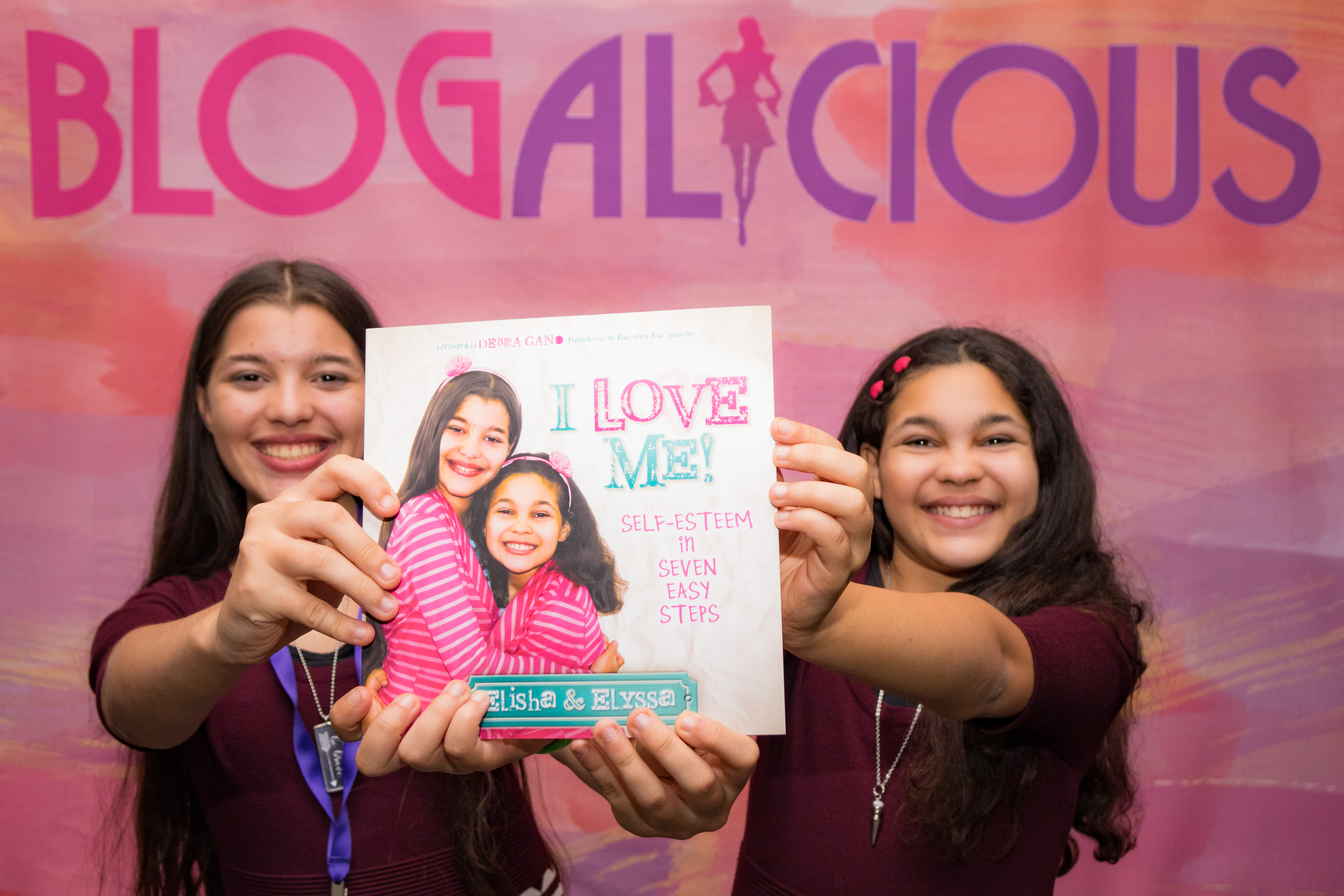 The WhollyART sisters at Blogalicious with their book, I Love ME! 